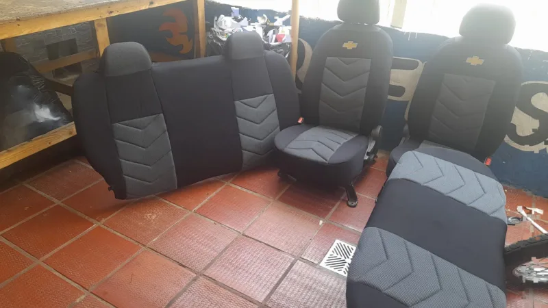 FORROS CHEVROLET SAIL  SEDAN con riñonera